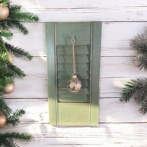 Green Shutter Wall Decor with Ornament